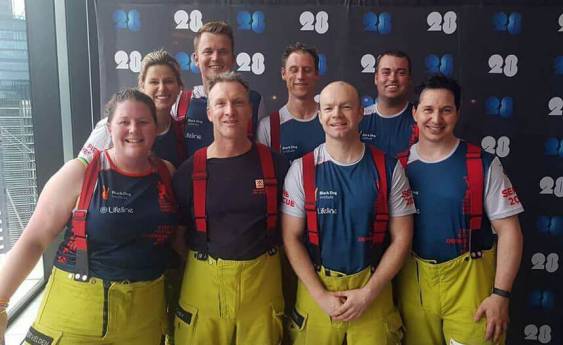 Firefighters take on stair run for charity